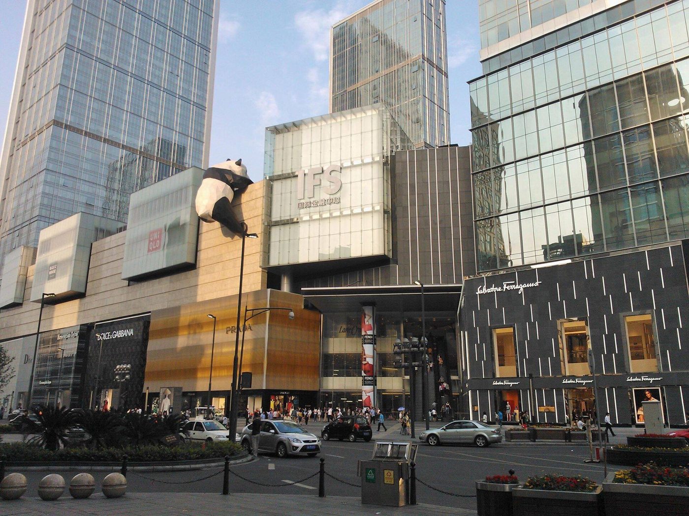 The twin towers of Chengdu IFS and the giant panda sculpture climbing the mall facade